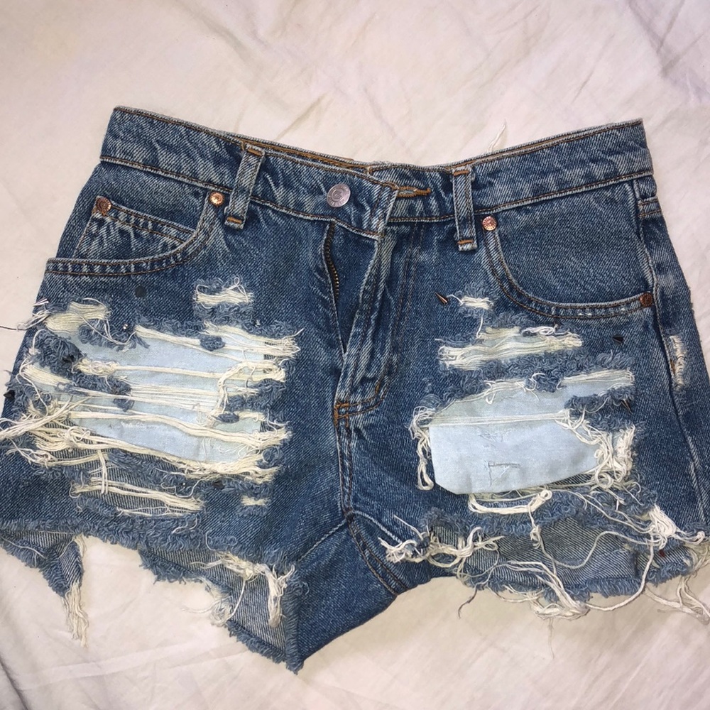 Distressed denim shorts
